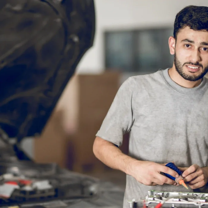 repairman repairing abs